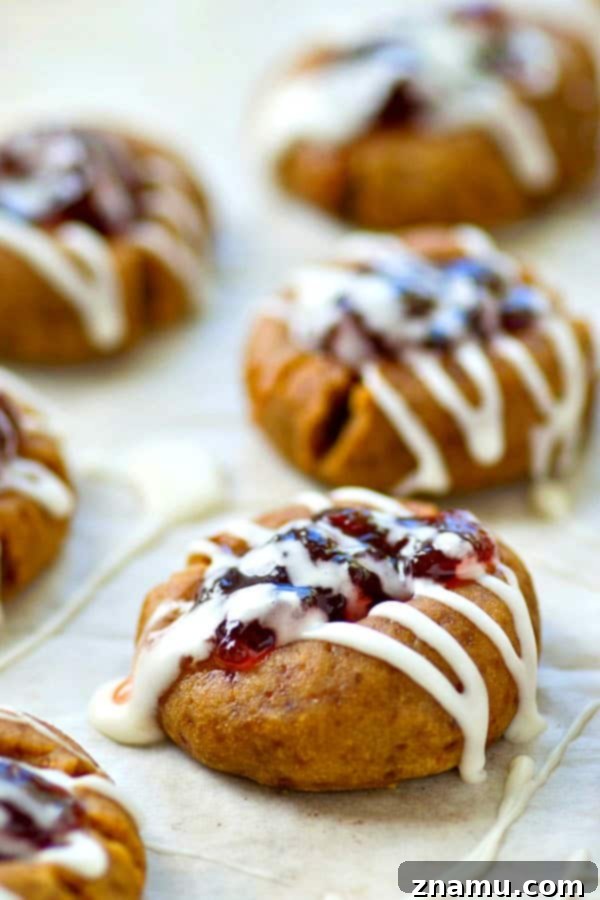 Blueberry Pie Thumbprint Jewels 5 Buttery shortbread cookies are filled with a homemade blueberry pie filling and drizzled with tons of glaze.---it's impossible to only eat one of these thumbprint cookies!