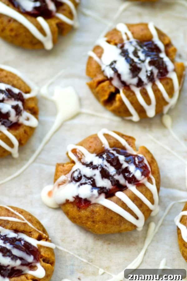 Blueberry Pie Thumbprint Jewels 6 Buttery shortbread cookies are filled with a homemade blueberry pie filling and drizzled with tons of glaze.---it's impossible to only eat one of these thumbprint cookies!