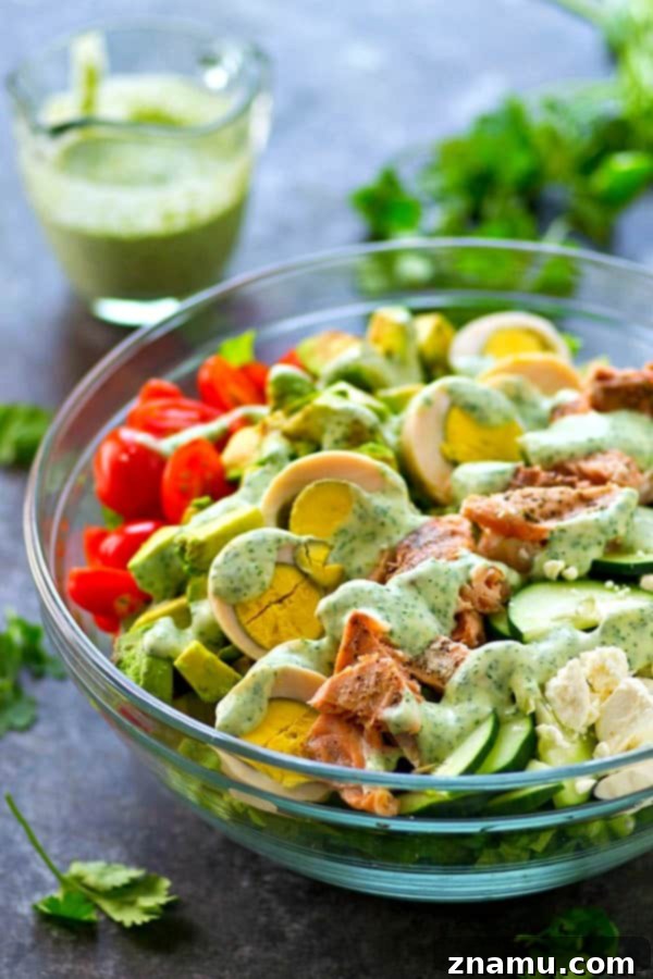 Grilling season has arrived! Get ready for fresh, healthy recipes like this Grilled Salmon Cobb Salad.