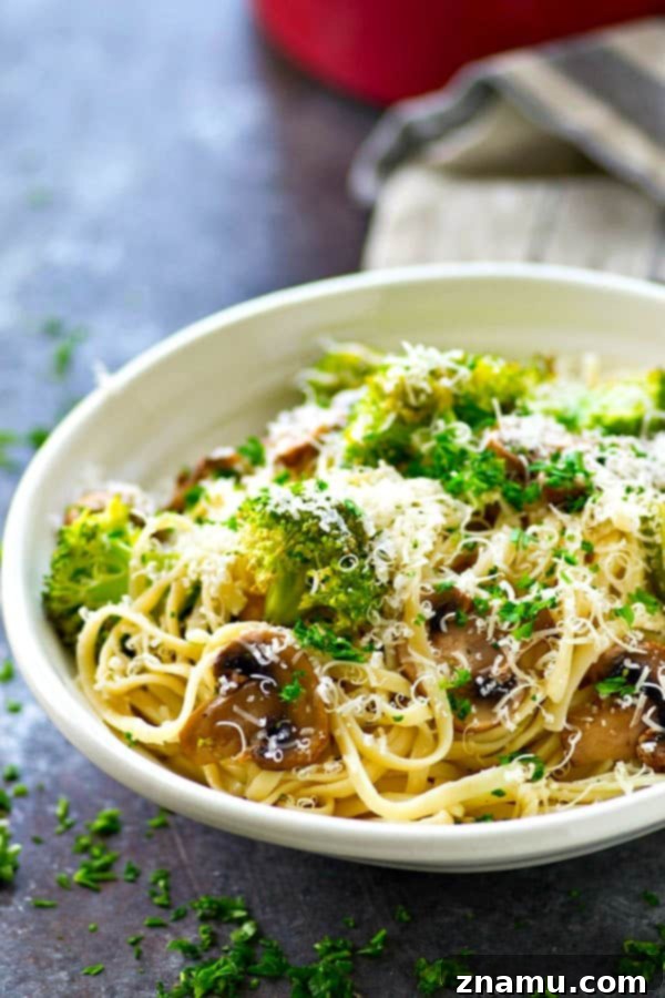 Browned Butter Parmesan Fettuccine with Umami-Rich Mushrooms and Vibrant Broccoli 3 Close-up of creamy Parmesan fettuccine with browned butter sauce