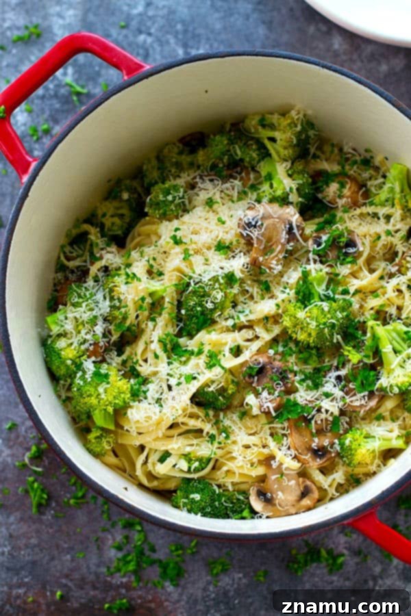 Browned Butter Parmesan Fettuccine with Umami-Rich Mushrooms and Vibrant Broccoli 5 Hearty bowl of browned butter Parmesan pasta with veggies
