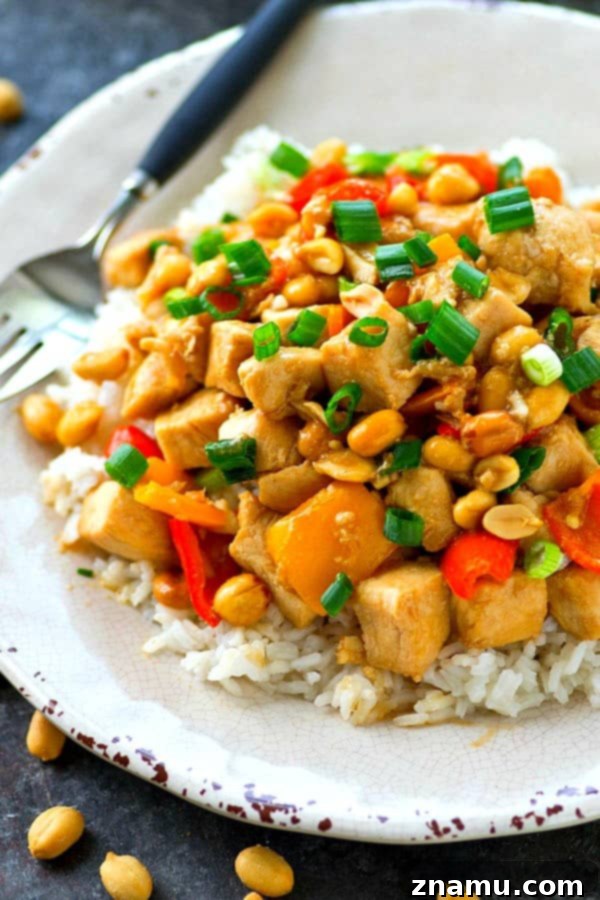 Quick Lighter Kung Pao Chicken Skillet 4 Close-up of the Lighter Kung Pao Chicken Skillet, showing tender chicken, colorful peppers, and peanuts.
