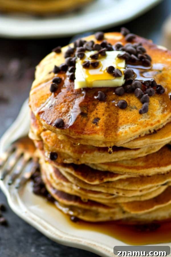Decadent Almond Butter Chocolate Chip Flapjacks 2 Experience the ultimate fluffy almond butter chocolate chip pancakes – a perfect breakfast or brunch treat ready in minutes.