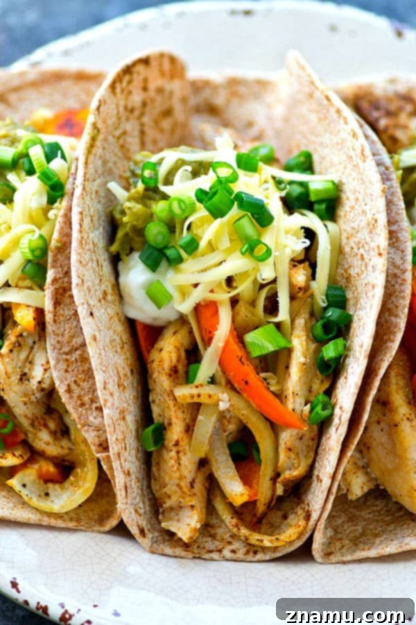 Sheet Pan Spicy-Sweet Chicken Tacos 6 Ingredients for sheet pan chile chicken and sweet pepper tacos prepped and ready for cooking.