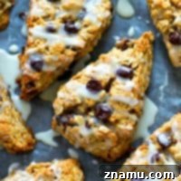 Glazed Chocolate Chip Oatmeal Scones 8 Drizzled with tons of vanilla glaze and unbelievably flaky, these oatmeal chocolate chip scones are a killer breakfast indulgence with your morning coffee!
