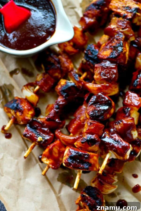 Aloha Chicken Kebabs 2 Flavorful Hawaiian BBQ Chicken Kebabs ready for the grill with homemade pineapple sauce.