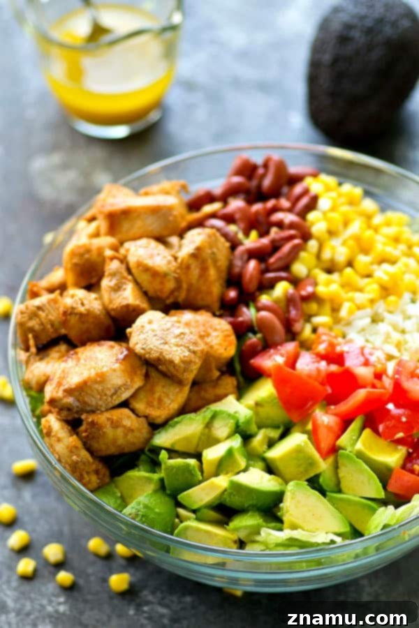 Zesty Blackened Chicken Avocado Bowl 2 Flavorful blackened chicken, avocado, and tons of other Mexican-style goodness collide in this loaded Mexican salad that is SO easy to throw together---you'll be making it all summer!