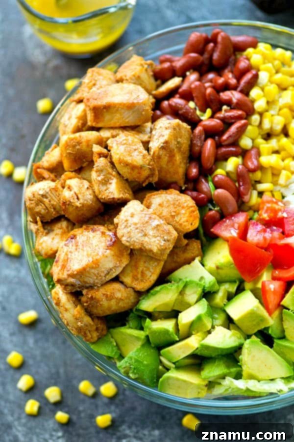 Zesty Blackened Chicken Avocado Bowl 3 Flavorful blackened chicken, avocado, and tons of other Mexican-style goodness collide in this loaded Mexican salad that is SO easy to throw together---you'll be making it all summer!