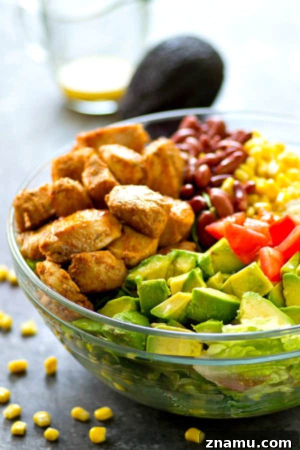 Zesty Blackened Chicken Avocado Bowl 4 Flavorful blackened chicken, avocado, and tons of other Mexican-style goodness collide in this loaded Mexican salad that is SO easy to throw together---you'll be making it all summer!