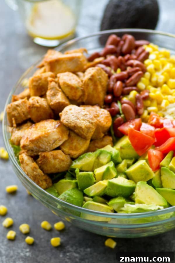 Zesty Blackened Chicken Avocado Bowl 6 Flavorful blackened chicken, avocado, and tons of other Mexican-style goodness collide in this loaded Mexican salad that is SO easy to throw together---you'll be making it all summer!