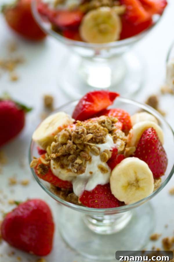 Top view of an assembled Strawberry Banana Oatmeal Cookie Yogurt Parfait