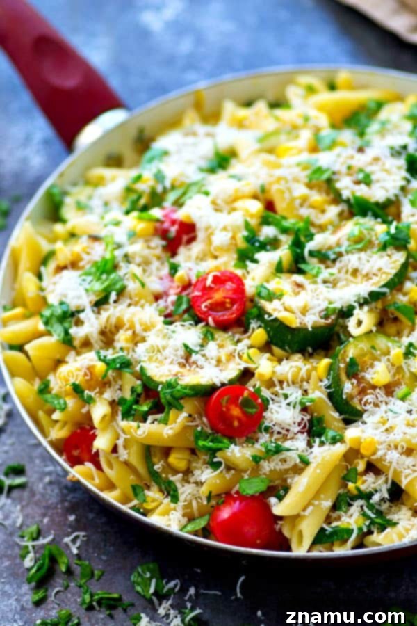 Sun-Kissed Grilled Summer Pasta 3 Close-up of fresh grilled zucchini and corn, ready to be added to pasta primavera