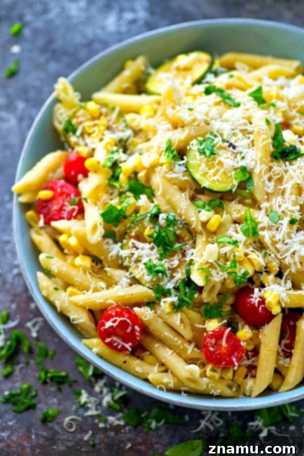 Sun-Kissed Grilled Summer Pasta 6 Overhead view of a vibrant bowl of Grilled Summer Vegetable Pasta Primavera