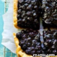 Blueberry Sugar Cookie Pie 8 Classic blueberry pie gets a makeover into EASY pan pie form with the most amazing soft sugar cookie crust and sweet blueberry filling.--- the easiest way to make pie this summer!