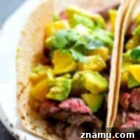 Citrus Grilled Steak Tacos with Orange Avocado Salsa recipe image.