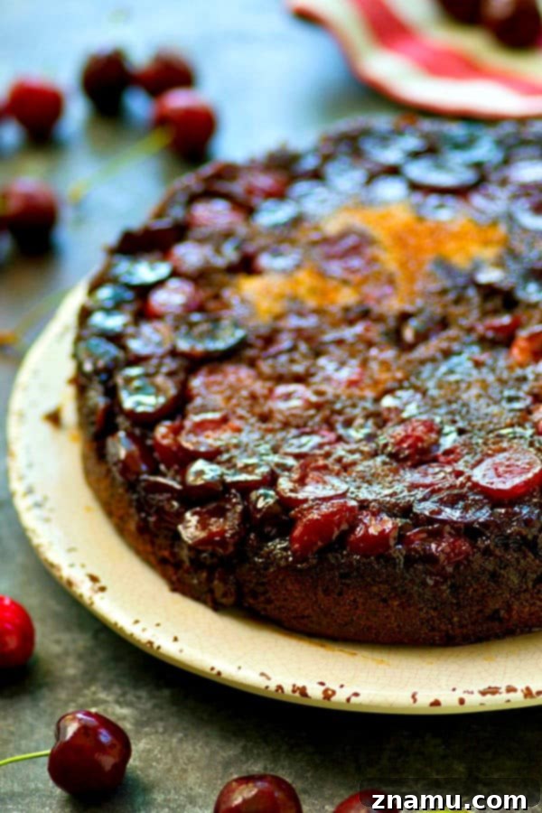 Juicy Cherry Upside-Down Morning Cake 4 Homemade cherry upside-down coffee cake with a generous cherry topping
