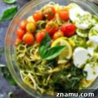 Charred Tomato and Mozzarella Spaghetti with Bright Lemon Basil Dressing 8 Charred Tomato Mozzarella Spaghetti with Lemon Basil Vinaigrette - A delightful summer pasta salad recipe.
