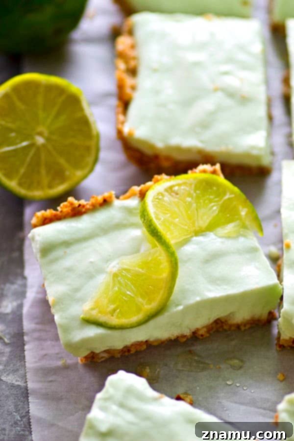 Zesty No-Bake Key Lime Cheesecake Bars 4 Delicious Key Lime Pie Cheesecake Bars, a perfect no-bake dessert.