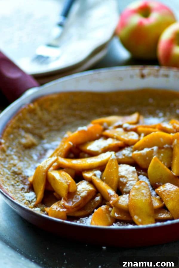 Caramel Apple Chai Puff 2 Buttery chai-spiced dutch baby is filled with tons of sweet caramelized apples for the easiest and most indulgent breakfast you'll ever make this fall!