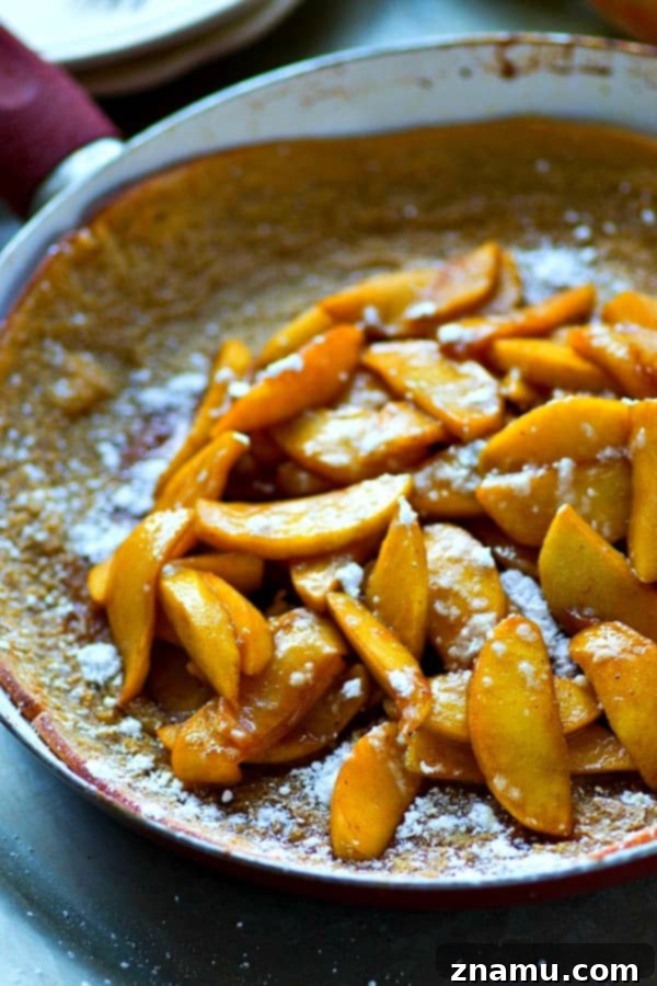 Caramel Apple Chai Puff 3 Buttery chai-spiced dutch baby is filled with tons of sweet caramelized apples for the easiest and most indulgent breakfast you'll ever make this fall!