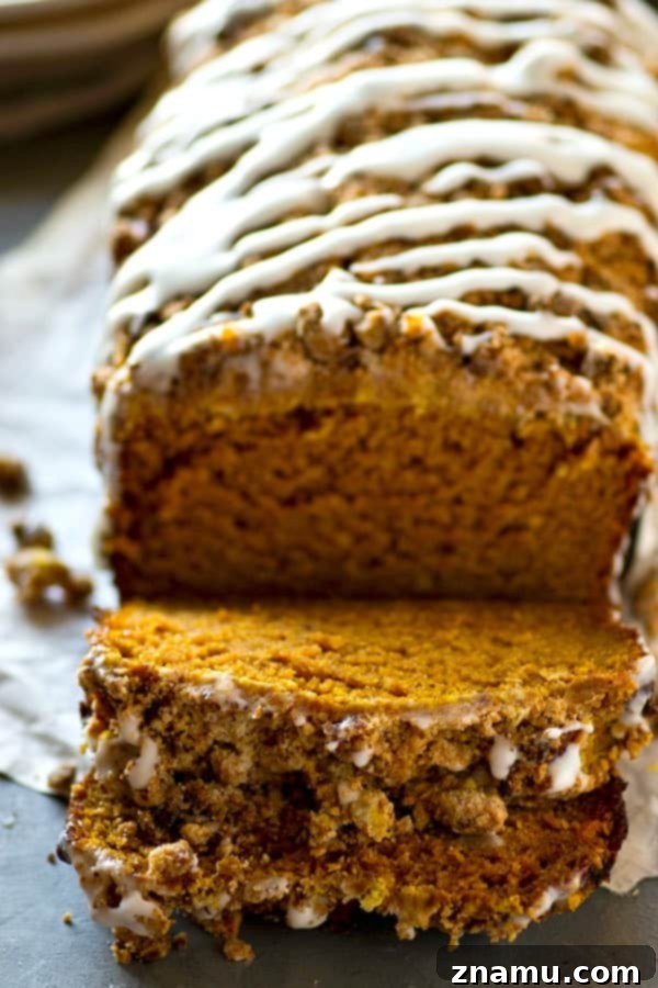 Coffee Glazed Pumpkin Streusel Bread 3 Close-up of Streusel Pumpkin Bread with Coffee Glaze showing its moist texture