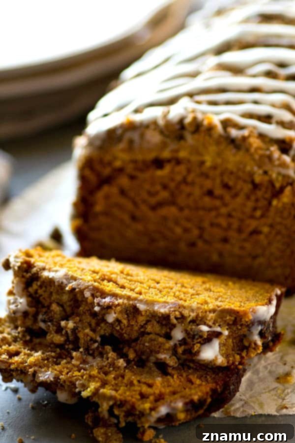 Coffee Glazed Pumpkin Streusel Bread 4 Sliced Streusel Pumpkin Bread on a cooling rack, ready to be glazed