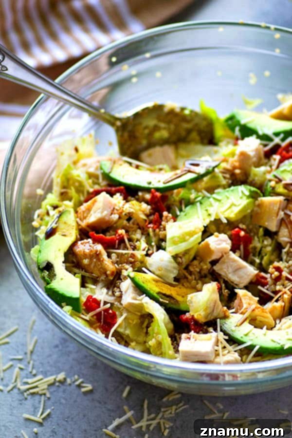 Balsamic Chicken Avocado Quinoa Medley 2 This beautiful quinoa salad is packed full of juicy chicken, soft sun-dried tomatoes, tons of avocado, and a flavorful balsamic dressing for the healthiest + prettiest salad you could ever dream of!