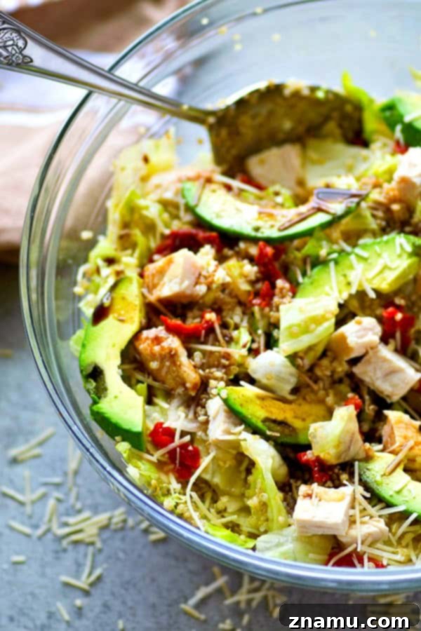 Balsamic Chicken Avocado Quinoa Medley 3 This beautiful quinoa salad is packed full of juicy chicken, soft sun-dried tomatoes, tons of avocado, and a flavorful balsamic dressing for the healthiest + prettiest salad you could ever dream of!