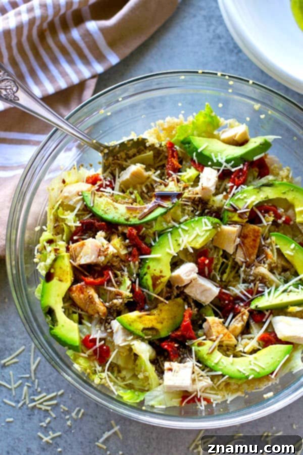 Balsamic Chicken Avocado Quinoa Medley 5 This beautiful quinoa salad is packed full of juicy chicken, soft sun-dried tomatoes, tons of avocado, and a flavorful balsamic dressing for the healthiest + prettiest salad you could ever dream of!