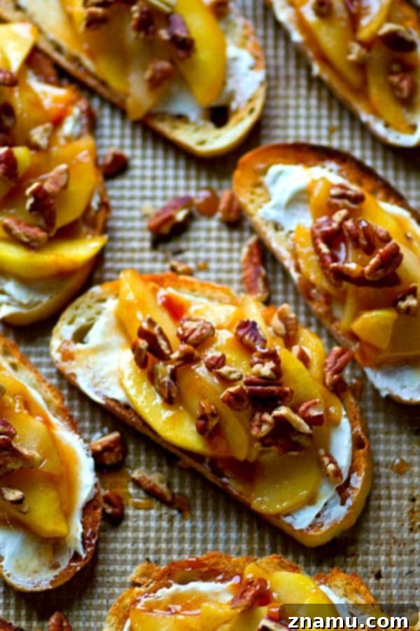 Caramel Apple Cream Cheese Crostini 3 Caramelized Apple Cream Cheese Bruschetta with a rustic background, highlighting the golden apples and creamy texture.