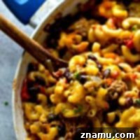 Made entirely in ONE pot and lighter on the calories, this hearty beef chili mac 'n' cheese is going to quickly become the most-requested dinner in your house!
