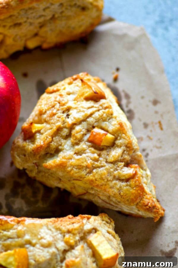 Maple Apple Cream Cheese Scones 2 Warm and flaky Maple Cream Cheese Apple Scones, a perfect fall breakfast with a rich cream cheese texture and sweet maple glaze.
