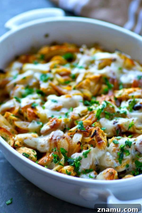 Ultimate Caramelized French Onion Soup Stuffing 3 Close-up of French Onion Soup Stuffing, showcasing its rich texture and cheesy top