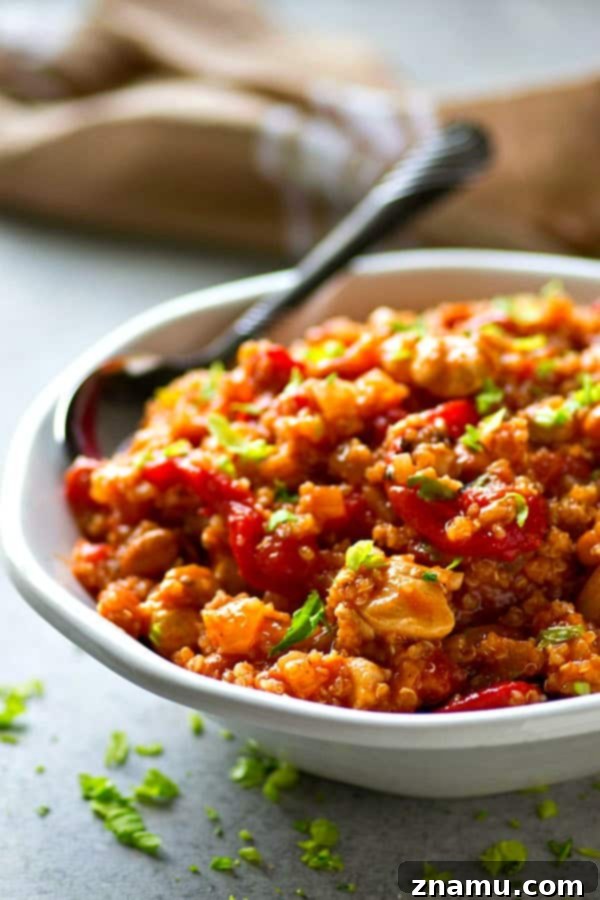 Delicious and hearty Roasted Red Pepper Quinoa Turkey Chili, perfect for using up Thanksgiving leftovers.