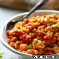 Use up turkey leftovers to make this massively flavorful roasted red pepper quinoa turkey chili! You can throw it together in minutes and it's so hearty and filling!
