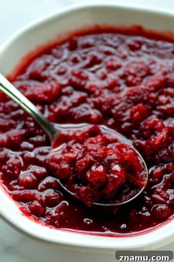 Slow Cooker Ginger Cranberry Apple Sauce 3 Preparing fresh cranberries and apples for the easy crockpot sauce