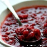 Make your cranberry sauce this Thanksgiving the easy way! This gingered apple cranberry sauce makes itself entirely in the crockpot and it's packed with sweet 'n' spicy ginger flavors.