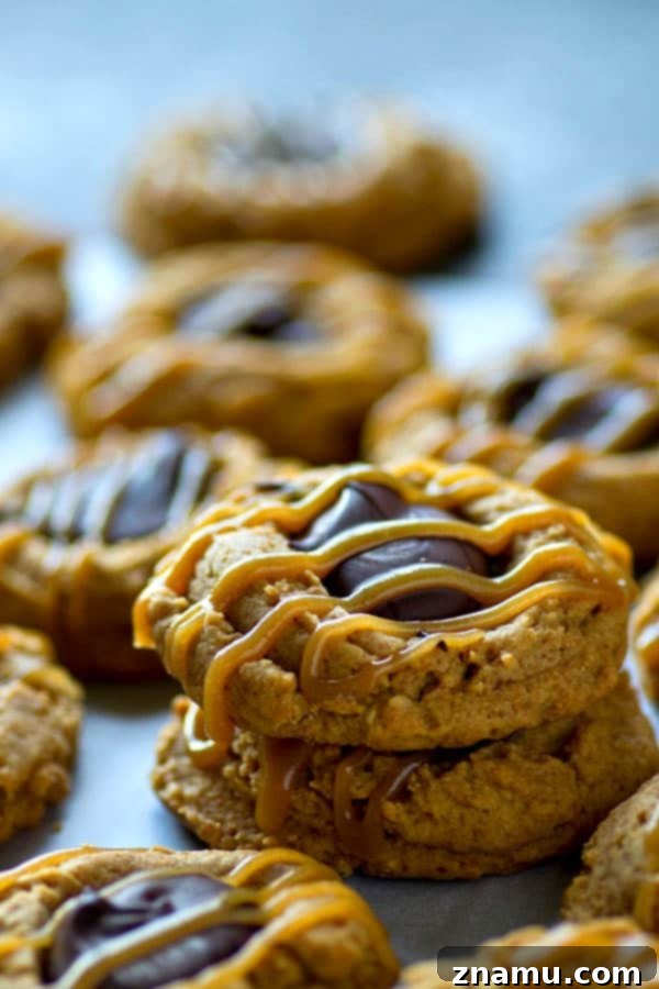 Delicious peanut butter thumbprint cookies with chocolate and caramel