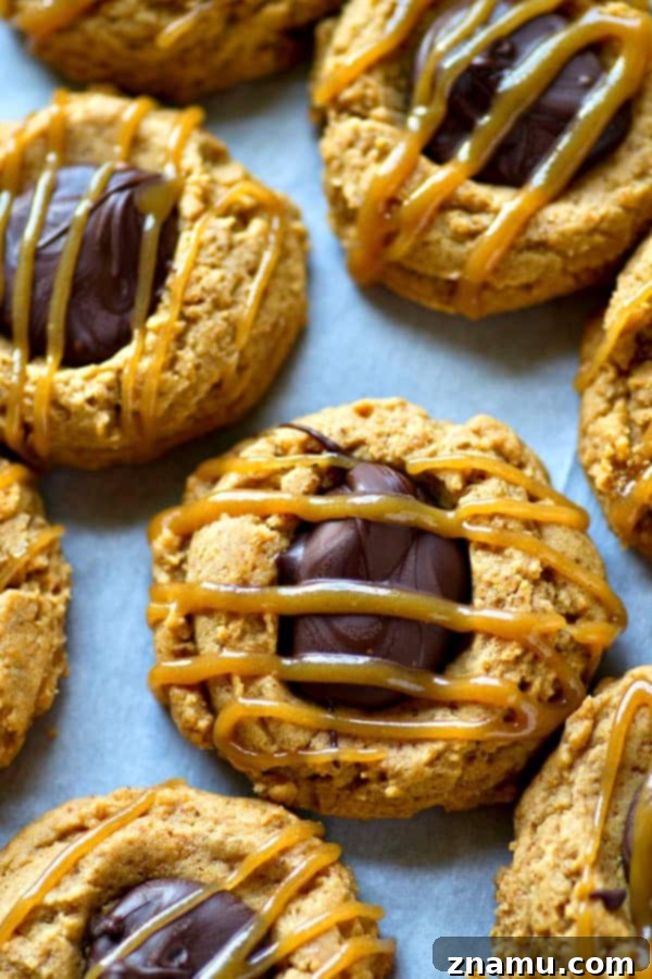 Peanut butter thumbprint cookies drizzled with homemade caramel sauce