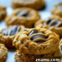 Peanut Butter Caramel Chocolate Thumbprints with a rich caramel drizzle