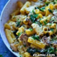 A small, enticing picture of the finished browned butter rigatoni dish with mushrooms and kale.