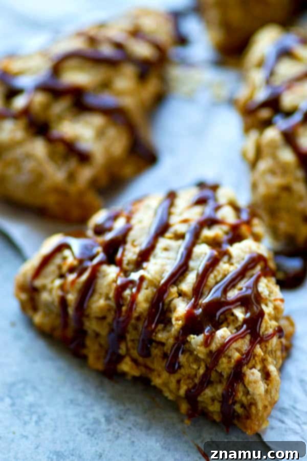 Coffeehouse Caramel Macchiato Oatmeal Scones 5 Finished Caramel Macchiato Oatmeal Scones piled high with thick salted caramel drizzle