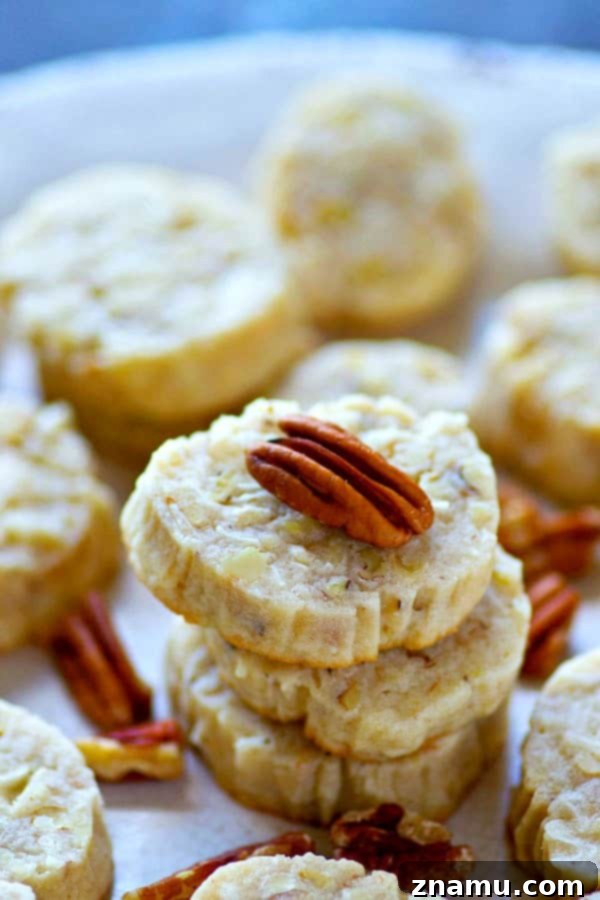 Golden Slice-and-Bake Butter Pecan Coconut Treats 3 The EASIEST slice 'n' bake cookies you'll make this holiday season! These butter pecan coconut cookies are soft, buttery, and absolutely impossible to stop eating.