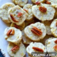Golden Slice-and-Bake Butter Pecan Coconut Treats 7 The EASIEST slice 'n' bake cookies you'll make this holiday season! These butter pecan coconut cookies are soft, buttery, and absolutely impossible to stop eating.