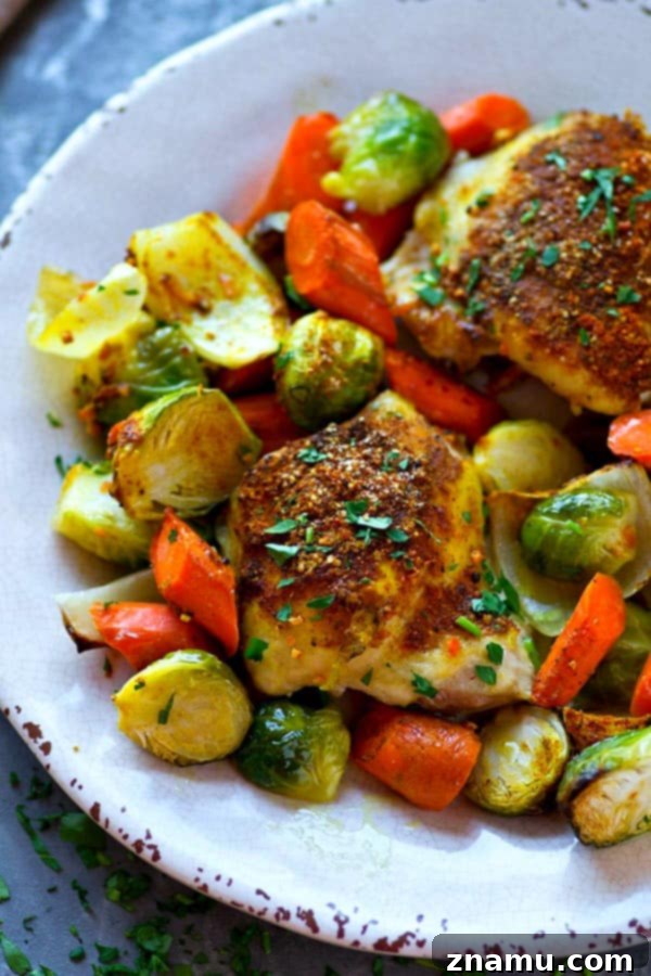 Moroccan Chicken Thighs with Roasted Vegetables 2 A flavorful Moroccan spice rub coats every inch of these juicy chicken thighs with tender roasted brussels sprouts and carrots.---the easiest and healthiest one sheet-pan dinner!