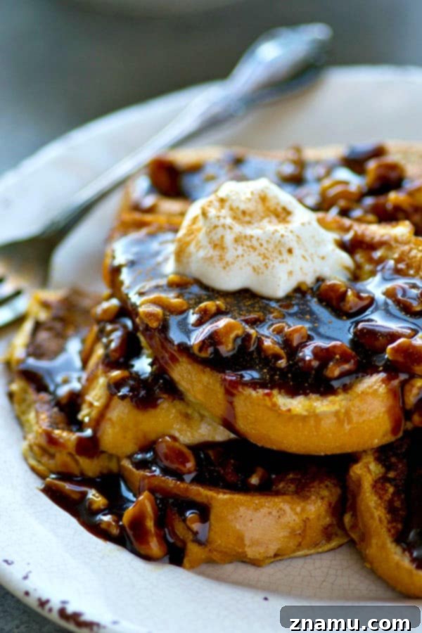 Spiced Gingerbread French Toast with Toasted Walnut Caramel Drizzle 4 A cozy scene with freshly made Gingerbread French Toast, topped with walnuts and caramel, capturing the warm, inviting essence of a holiday morning meal.