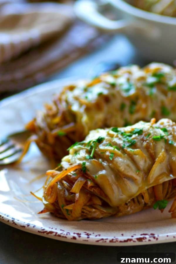 Loaded French Onion Hasselback Potatoes 2 Hasselback French Onion Soup Baked Potatoes with Caramelized Onions and Swiss Cheese