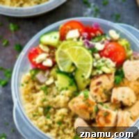 Make dinner way in advance with these meal prep Greek-style chicken quinoa bowls! So quick to throw together and packed full of healthy Greek goodness.