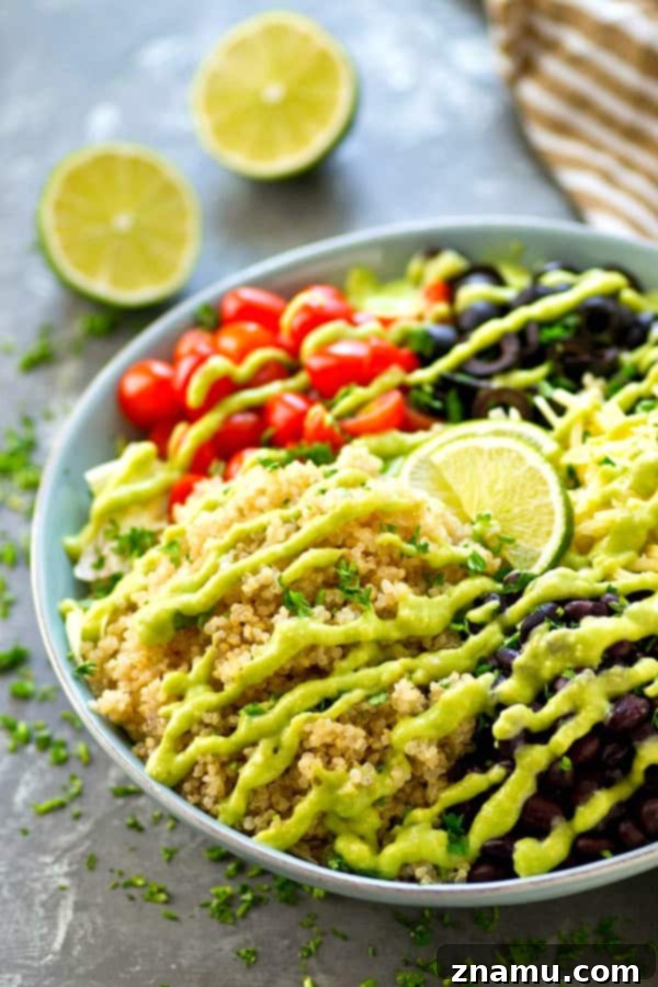 Vibrant Fiesta Quinoa Salad with Zesty Avocado Lime 2 Packed with tons of Mexican-style goodness and drizzled with a creamy avocado lime dressing, this colorful quinoa salad is so easy and so dang good, it will quickly become a dinner regular!