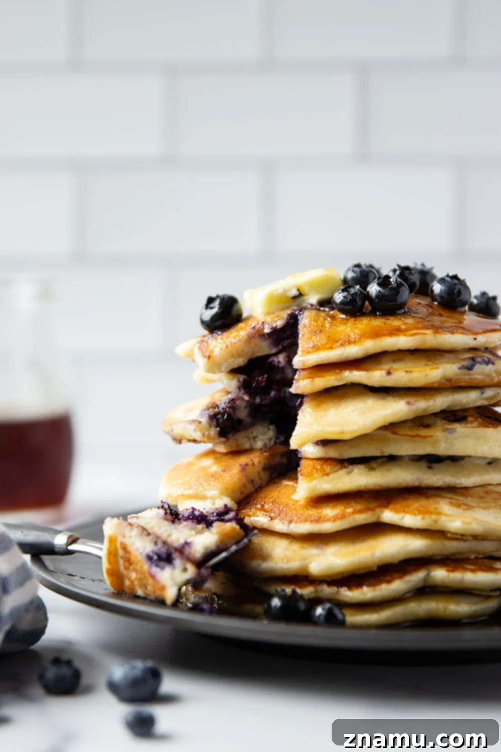 Ultimate Blueberry Buttermilk Pancakes 6 Perfectly thick and fluffy with a tangy buttermilk flavor and lots of juicy blueberries, these blueberry buttermilk pancakes truly are a keeper recipe!